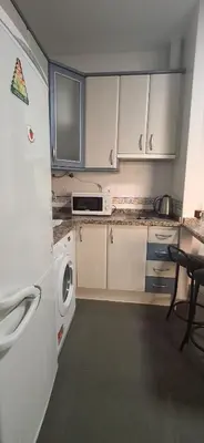Una cocina o zona de cocina en Coqueto apartamento a paso de la playa