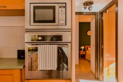 Una cocina o zona de cocina en Tranquilidad con vistas únicas, Piscina y Wifi - By Aloha Palma