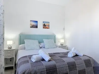 Cama o camas de una habitación en VVR Apto en Altos Nuevo Vera I