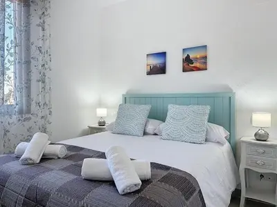 Cama o camas de una habitación en VVR Apto en Altos Nuevo Vera I
