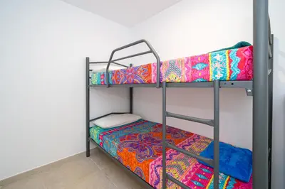 Cama o camas de una habitación en Gecko