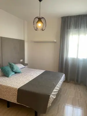 Cama o camas de una habitación en Bonito y tranquilo piso en Almerimar