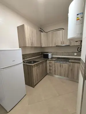 Una cocina o zona de cocina en APARTAMENTO TURISTICO 3ºA CARLOS III - Cerca de la playa