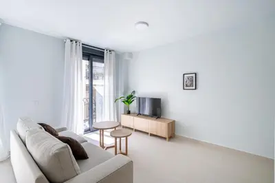 Zona de estar de Moott Homes Suites Arco de Braulio 1B
