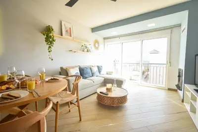 Zona de estar de Apartamento con Terraza, Piscina y Parking By Aloha Palma