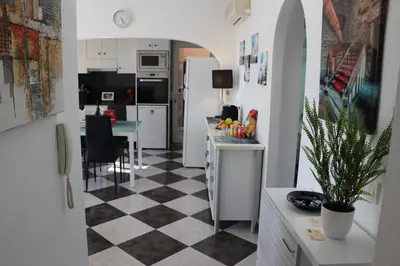 Una cocina o zona de cocina en Chalet Athos, Ferienwohnung mit Pool,Dachterasse, Meer und Bergblick in San Juan de los Terreros