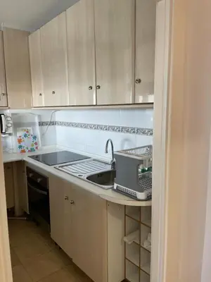 Una cocina o zona de cocina en Apartamento paseo Maritimo