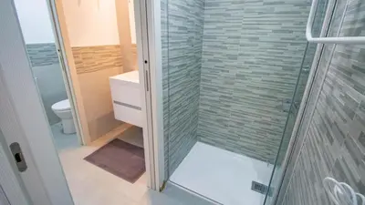 Un baño de Los Hermanos
