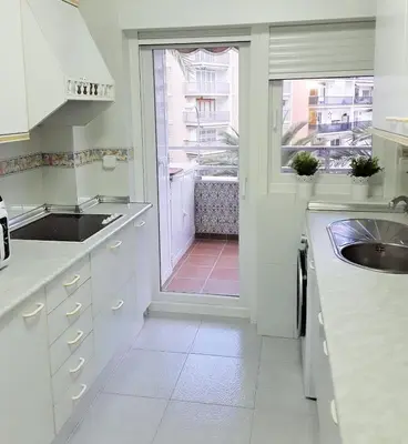 Una cocina o zona de cocina en Apartamento Paseo Maritimo wifi