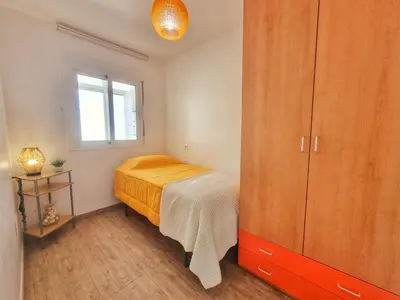 Cama o camas de una habitación en Apto RAYO DE SOL, primera línea playa, Cabo de Gata