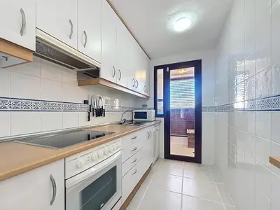 Una cocina o zona de cocina en VVR - Apto 2 Dorm con Terraza y Vistas