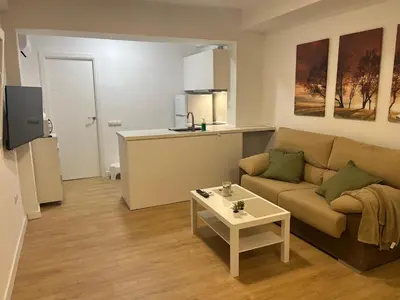 Una televisión o centro de entretenimiento en Premium Apartments Santaella