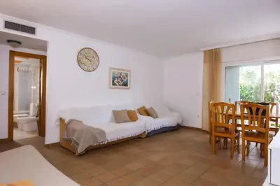 Zona de estar de Vera Playa El Oasis Bajo con Jardin y Piscinas