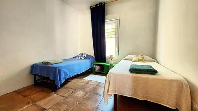 Cama o camas de una habitación en La Casa de las Golondrinas
