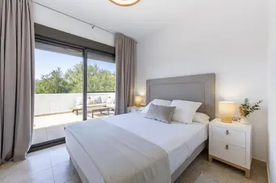 Cama o camas de una habitación en AlmeriaSuite Vera Luxury Homes