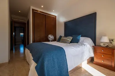 Cama o camas de una habitación en The Garden Apartment