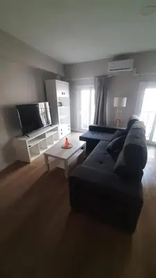 Una televisión o centro de entretenimiento en Almería Centro- Piso Reformado, Exterior, WiFi, a 1 minuto de Puerta Purchena