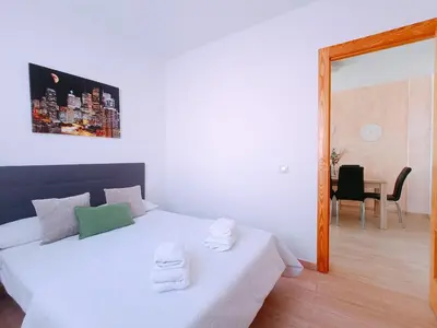 Cama o camas de una habitación en Cala Grande suites 3 hab, vistas al mar y terraza