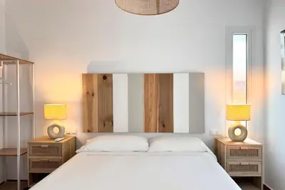 Cama o camas de una habitación en Apartamentos Julio Visconti