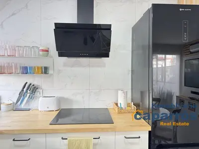 Una cocina o zona de cocina en Chalet El Coto Vera Playa, Tres dormitorios, Urbanización Piscina, Terraza, Sótano, Garaje