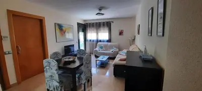Una televisión o centro de entretenimiento en Apartamento Aguamarina