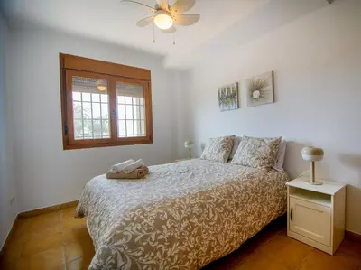 Cama o camas de una habitación en Mediterranea 15 Plaomares, 2 dormitorios 2 baños