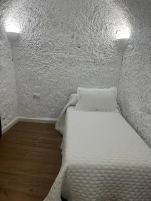 Cama o camas de una habitación en Cueva El Rincón de la Calma