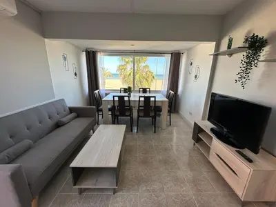 Una televisión o centro de entretenimiento en Costa Serena apartment 1ª línea