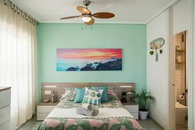 Cama o camas de una habitación en Atico En Faro
