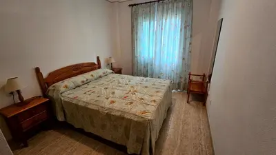 Cama o camas de una habitación en Apartamento de 2 dormitorios en Veramar 5 Primera Linea de Playa