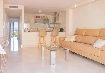 Zona de estar de Apartamento feta playa