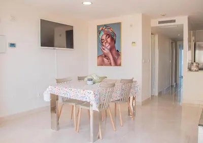 Una televisión o centro de entretenimiento en Apartamento feta playa