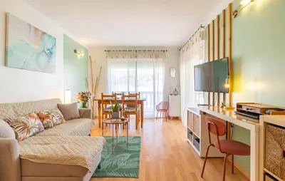 Una televisión o centro de entretenimiento en Alba De La Luna Apartment