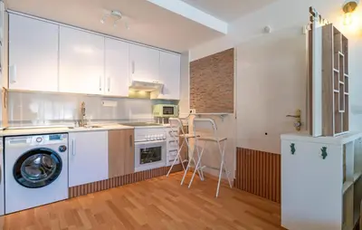 Una cocina o zona de cocina en Alba De La Luna Apartment