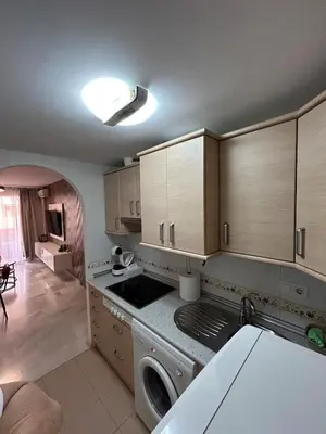 Una cocina o zona de cocina en Apartamento a un paso de la playa