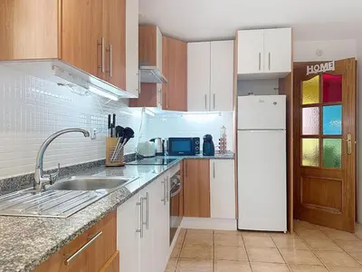 Una cocina o zona de cocina en VVR Bajo 3 Dormitorios con Jardin y Piscinas