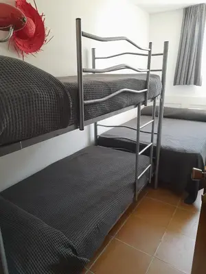 Cama o camas de una habitación en Puerto Rey Apartamento 150m playa