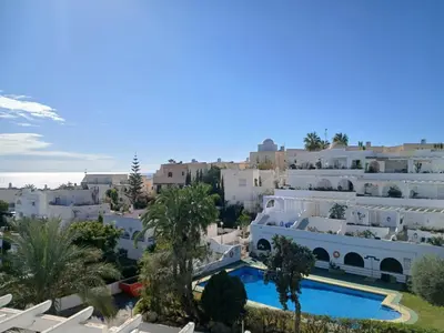 Piscina en o cerca de Sunny apartment in Mojácar with sea views