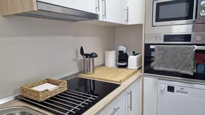 Una cocina o zona de cocina en Gran terraza Apartamento playa Garrucha