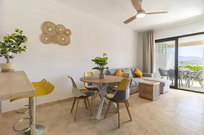 Zona de estar de Apartamento a Estrenar Piscina y Parking Gratis
