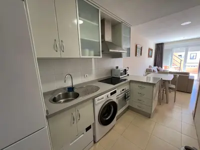 Una cocina o zona de cocina en apartamento piscina privada