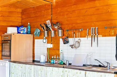 Una cocina o zona de cocina en Camp y Niño