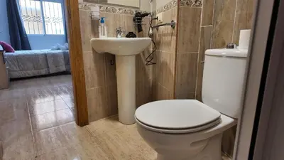Un baño de Apartalux Aura Essence