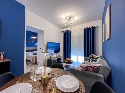 Cama o camas de una habitación en Roquetas Coastal Escape
