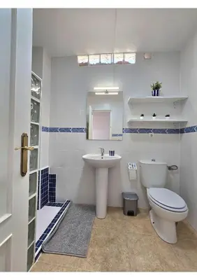 Un baño de El Oficio