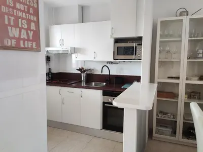 Una cocina o zona de cocina en Casa Helios - Precioso ático con sol, mar y relax