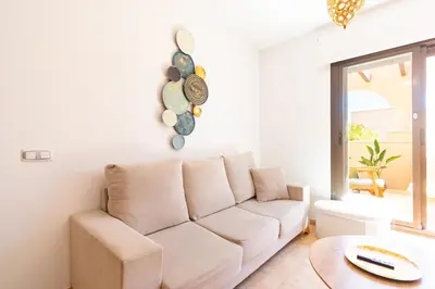 Zona de estar de Apartamento con terraza y piscina en Los Collados - By Aloha Palma