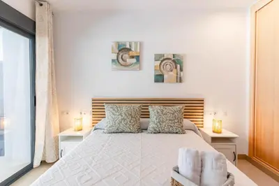 Cama o camas de una habitación en Apartamento Mirador Playa Serena IV R&R