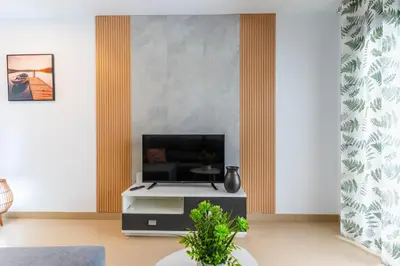 Una televisión o centro de entretenimiento en Apartamento Mirador Playa Serena IV R&R