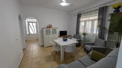 Una televisión o centro de entretenimiento en Céntrico apartamento junto al pimiento